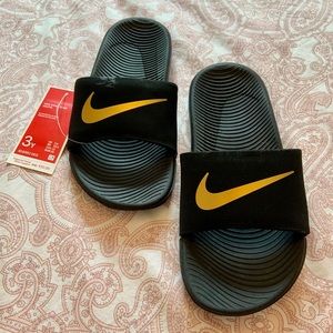 Nike slides (never worn)